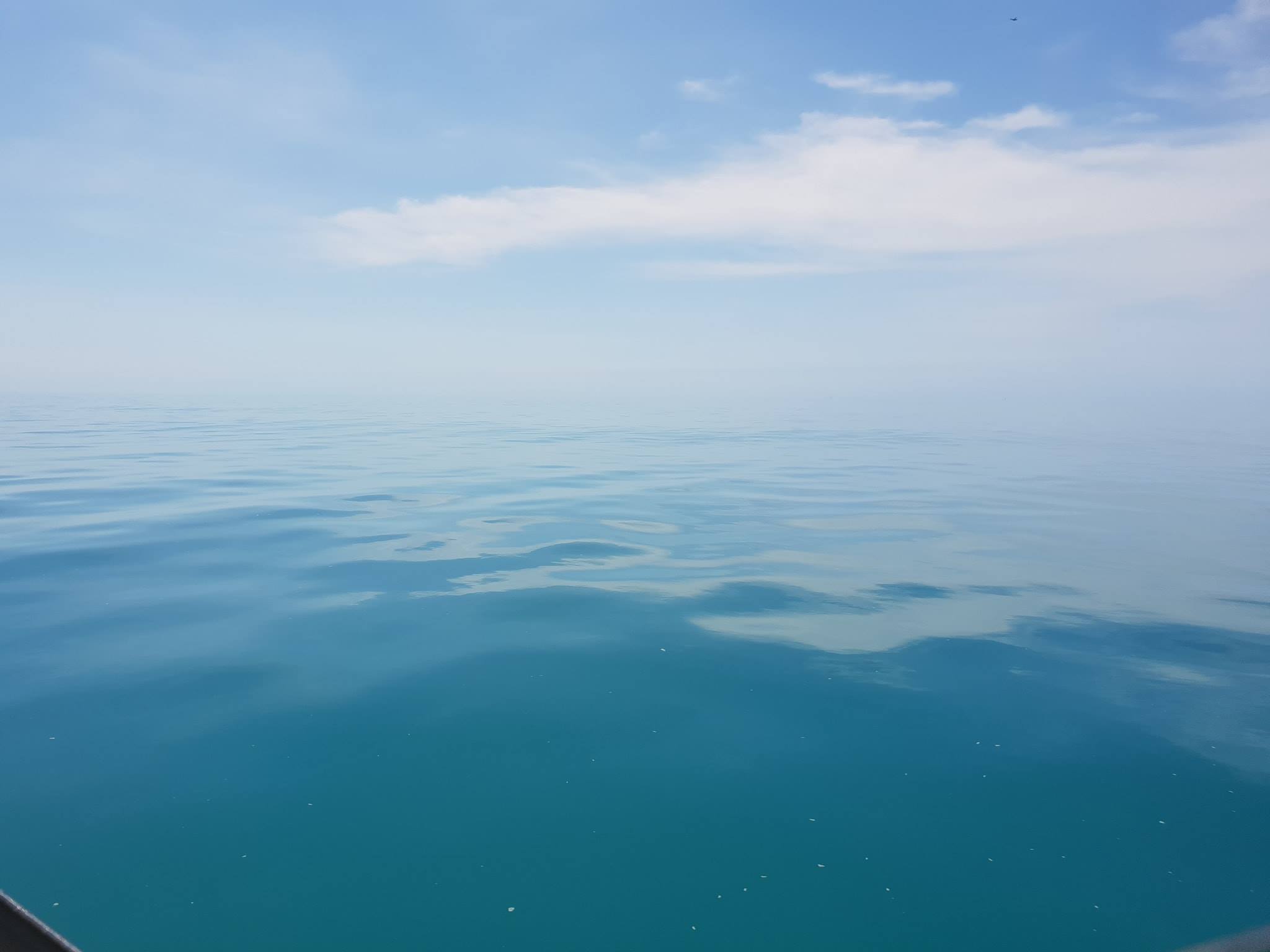 Glass conditions on the blue water with Offshore Boats