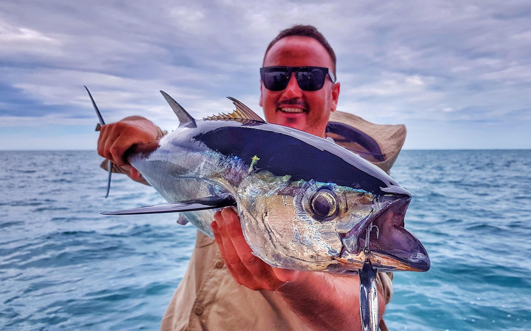Longtail tuna on the cast with Offshore Boats bluewater fishing charters